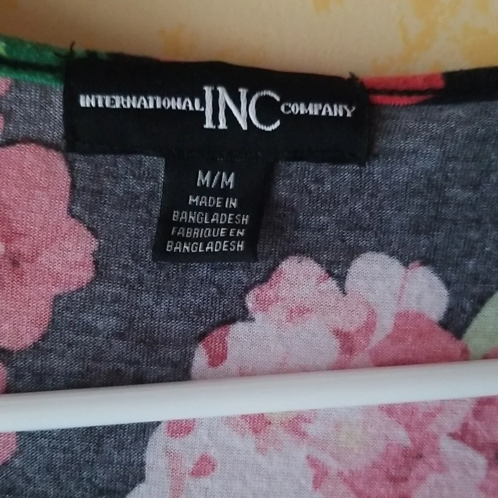 Dress in orange and black. - Picture 2 of 3